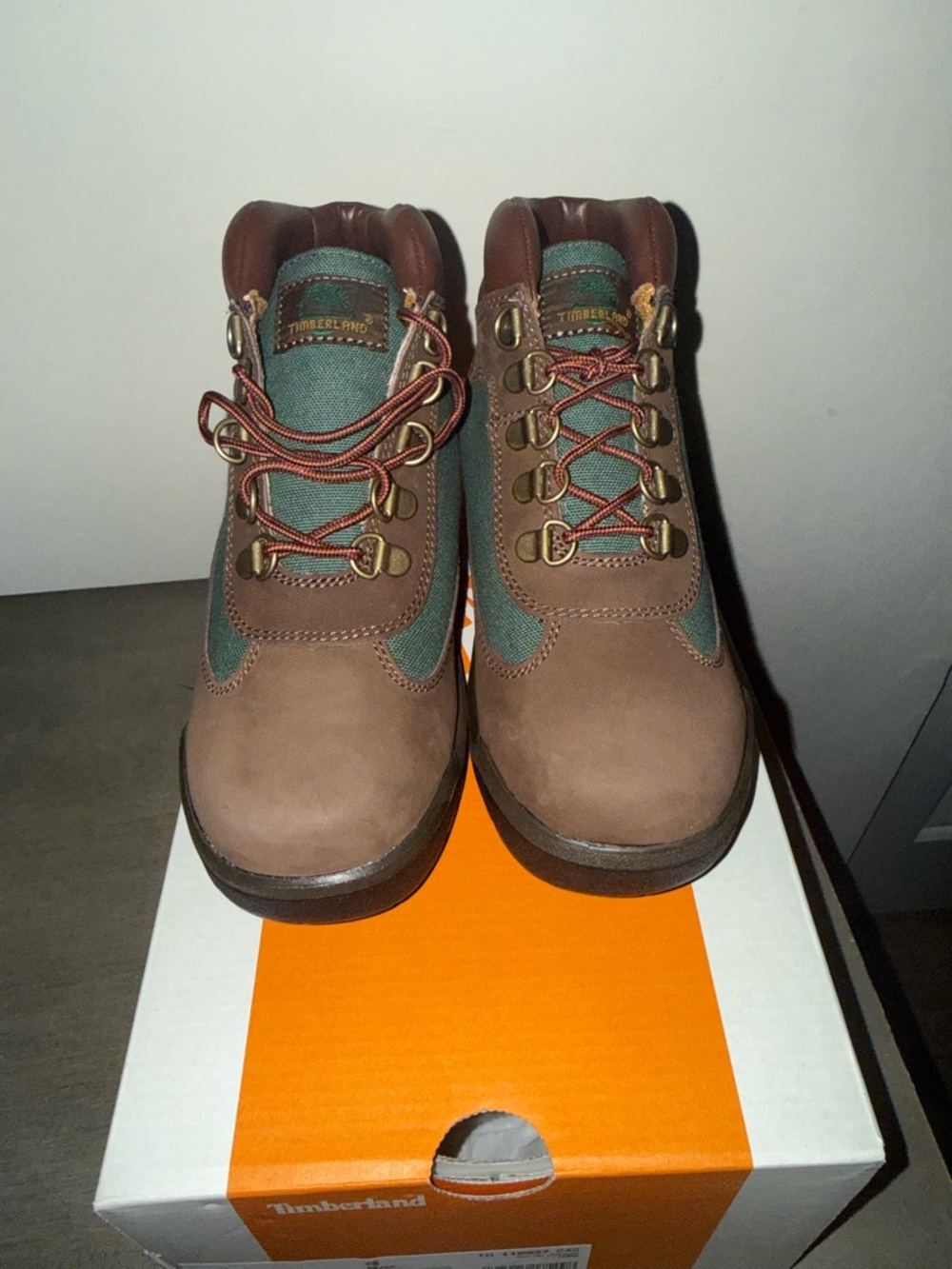 Size 4 in big kids/ 6 in women Timberland Boots